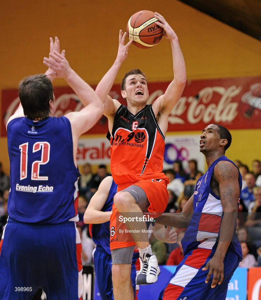 31 January 2010; Keith Anderson, Killester, in action against Niall O'Reilly, left, and Joshua Johnson, UCC Demons. Men's Superleague National Cup Final 2010, Killester v UCC Demons, National Basketball Arena, Tallaght, Dublin. Picture credit: Brendan Moran / SPORTSFILE