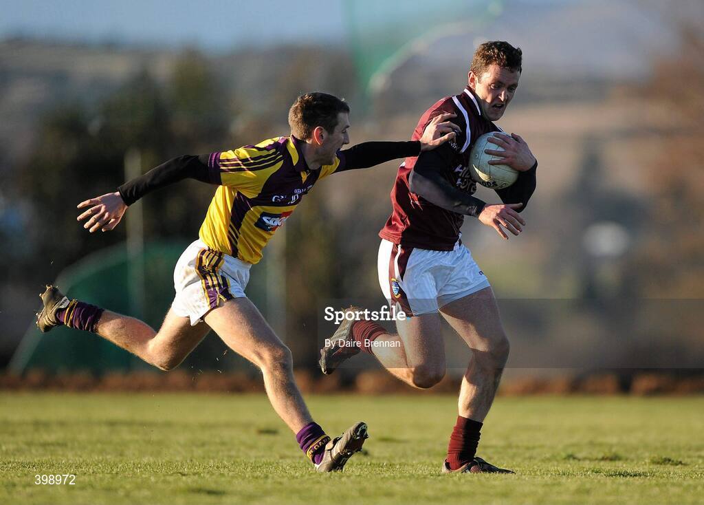 31 January 2010; Aidan Finnan, Westmeath, in action against Redmond Barry, Wexford. O'Byrne Shield Semi-Final, Pairc Ui Siochan, Wexford v Westmeath, Gorey, Co. Wexford. Picture credit: Daire Brennan / SPORTSFILE