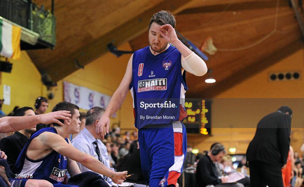 31 January 2010; A dejected Shane Coughlan, UCC Demons, leaves the court in the 4th quarter. Men's Superleague National Cup Final 2010, Killester v UCC Demons, National Basketball Arena, Tallaght, Dublin. Picture credit: Brendan Moran / SPORTSFILE