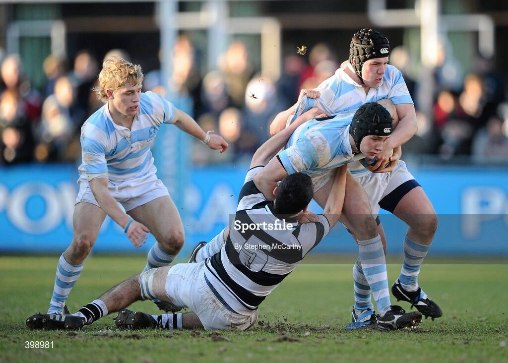 31 January 2010; Richard Marsh, Blackrock College, supported by team-mate Steven Wijntjes is tackled by Padraig F Pendred, Belvedere College. Leinster Schools Senior Cup First Round, Belvedere College v Blackrock College, Donnybrook Stadium, Donnybrook, Dublin. Picture credit: Stephen McCarthy / SPORTSFILE