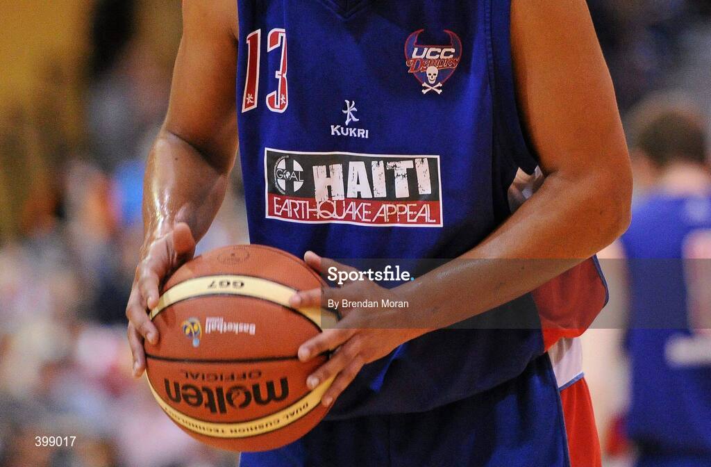 31 January 2010; A logo highlighting the Goal Haiti Earthquake Appeal on the singlet of UCC Demons player Carleton Cuff during the game. Men's Superleague National Cup Final 2010, Killester v UCC Demons, National Basketball Arena, Tallaght, Dublin. Picture credit: Brendan Moran / SPORTSFILE