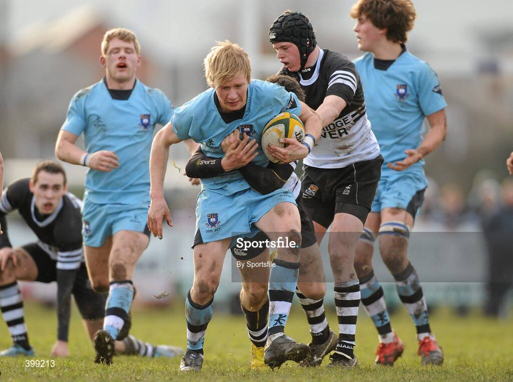 1 February 2010; Finlay Barry, St Michael's, is tackled by Sam Coughlan Murray, Newbridge College. Leinster Schools Senior Cup First Round, St Michael's v Newbridge College, Lakelands Park, Terenure, Dublin. Photo by Sportsfile