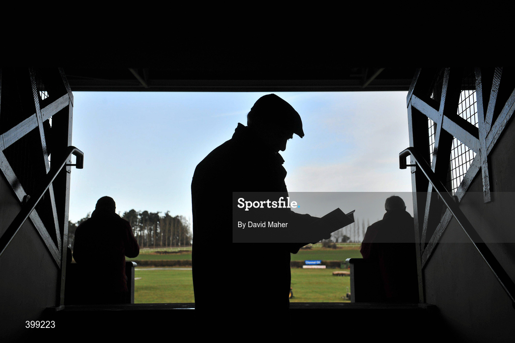 1 February 2010; Peter Reynolds, from Cork City, studies the form before the first round of the Hotel Minella Oaks. 85th National Coursing Meeting - Monday, Powerstown Park, Clonmel, Co. Tipperary. Picture credit: David Maher / SPORTSFILE