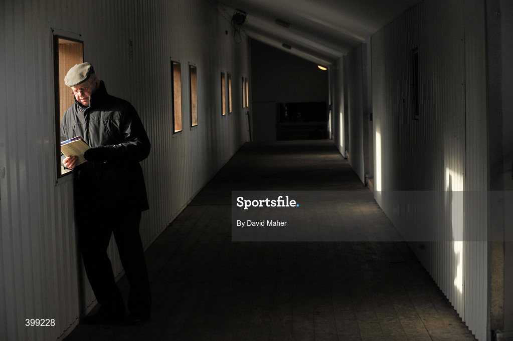 1 February 2010; PJ Auglim, from Rosegreen, Co.Tipperary, studies the form card before the first round of the Hotel Minella Oaks. 85th National Coursing Meeting - Monday, Powerstown Park, Clonmel, Co. Tipperary. Picture credit: David Maher / SPORTSFILE