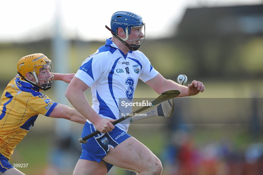 31 January 2010; Gary Hurney, Waterford in action against Cian Dillon, Clare. Munster GAA Waterford Crystal Hurling Cup Semi-Final, Waterford v Clare, Ballyduff GAA Grounds, Ballyduff Upper, Waterford. Picture credit: Matt Browne / SPORTSFILE *** Local Caption ***