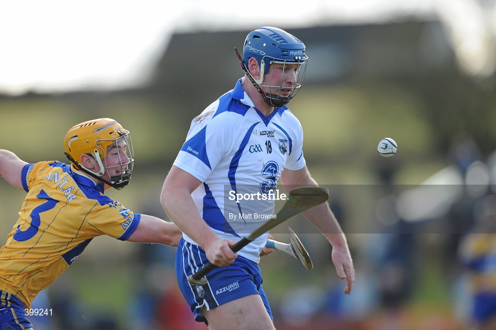 31 January 2010; Gary Hurney, Waterford in action against Cian Dillon, Clare. Munster GAA Waterford Crystal Hurling Cup Semi-Final, Waterford v Clare, Ballyduff GAA Grounds, Ballyduff Upper, Waterford. Picture credit: Matt Browne / SPORTSFILE *** Local Caption ***