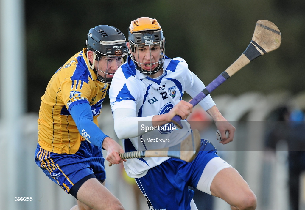31 January 2010; Maurice Shanahan, Waterford in action against Pat Donnellan, Clare. Munster GAA Waterford Crystal Hurling Cup Semi-Final, Waterford v Clare, Ballyduff GAA Grounds, Ballyduff Upper, Waterford. Picture credit: Matt Browne / SPORTSFILE *** Local Caption ***