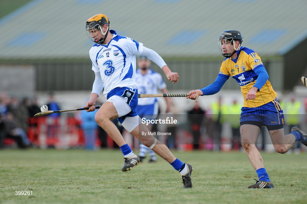 31 January 2010; Maurice Shanahan, Waterford in action against Pat Donnellan, Clare. Munster GAA Waterford Crystal Hurling Cup Semi-Final, Waterford v Clare, Ballyduff GAA Grounds, Ballyduff Upper, Waterford. Picture credit: Matt Browne / SPORTSFILE *** Local Caption ***