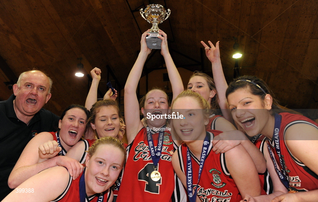 2 February 2010; Carol McCarthy, captain of Calasanctius Oranmore, Galway, holds the cup aloft after the game. All-Ireland School Cup Finals 2010 - U19 Girls A Final, Calasanctius Oranmore, Galway v St. Josephs Abbeyfeale, Co. Limerick, National Basketball Arena, Tallaght, Dublin. Photo by Sportsfile