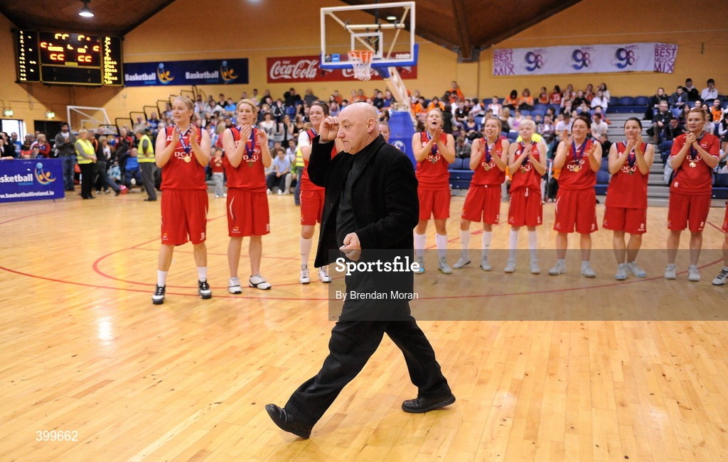 31 January 2010; DCU Mercy head coach Mark Ingle is applauded by his team as he makes his way to the podium to collect his winners medal. Women's Superleague National Cup Final 2010, Team Montenotte Hotel Cork v DCU Mercy, National Basketball Arena, Tallaght, Dublin. Picture credit: Brendan Moran / SPORTSFILE