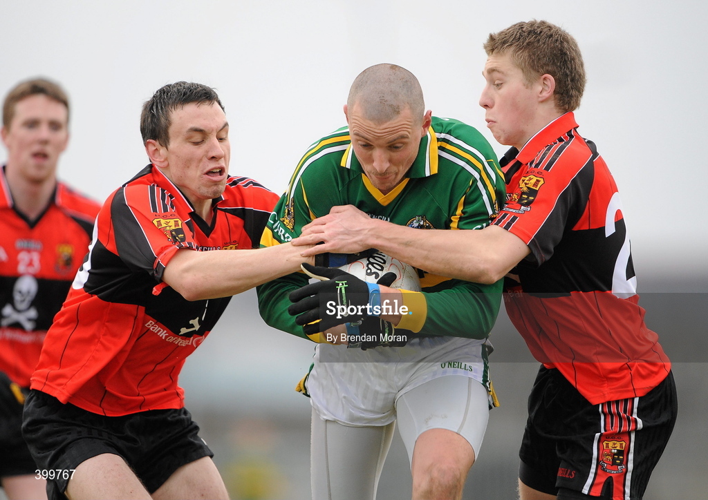 30 January 2010; Kieran Donaghy, Kerry, in action against Liam Jennings, left, and Peter Crowley, University College Cork. Munster GAA McGrath Cup Senior Football Final, Kerry v University College Cork, Austin Stack Park, Tralee, Co. Kerry. Picture credit: Brendan Moran / SPORTSFILE *** Local Caption ***