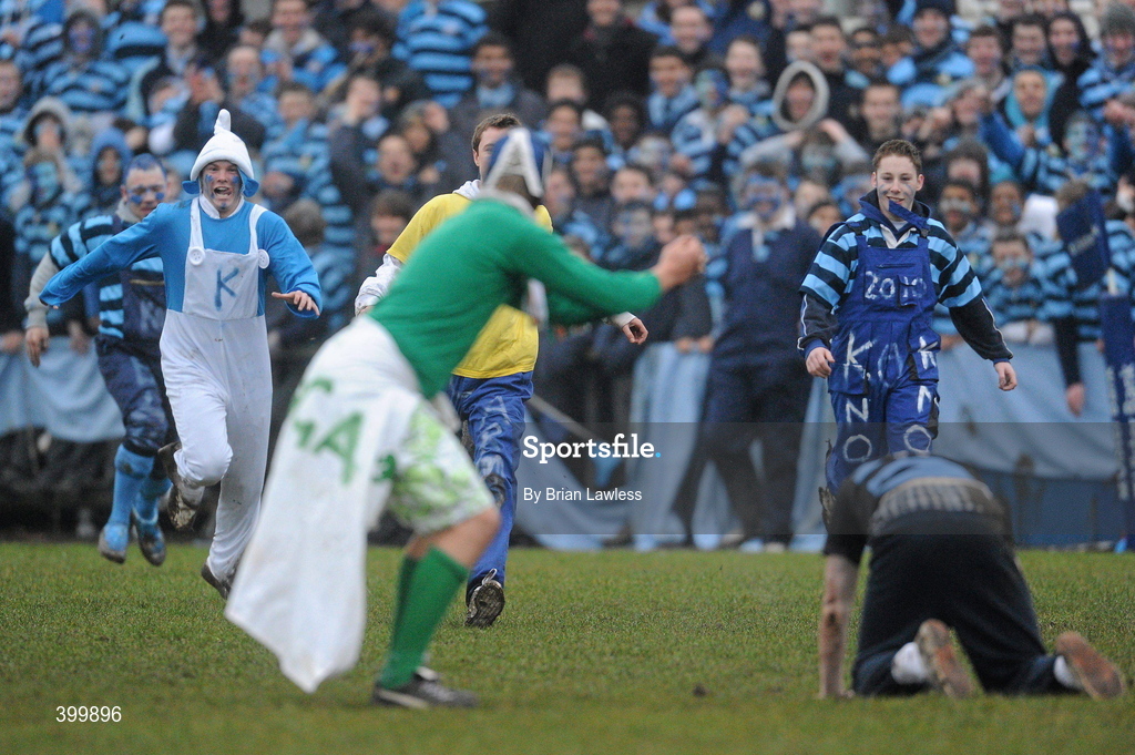 4 February 2010; Castleknock College supporters rush to the aid of their fellow pupil after he was tackled to the ground by a Gonzaga College SJ supporter. Leinster Schools Senior Cup 1st Round, Gonzaga College SJ v Castleknock College, Stradbrook Road, Blackrock, Co. Dublin. Picture credit: Brian Lawless / SPORTSFILE