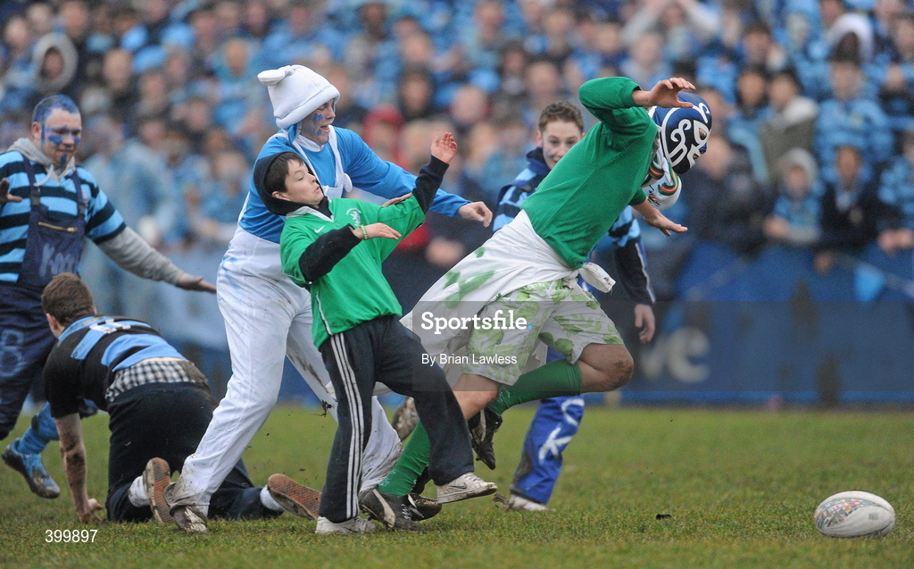 4 February 2010; Castleknock College supporters tackle a Gonzaga College SJ supporter after he tackled their fellow pupil to the ground. Leinster Schools Senior Cup 1st Round, Gonzaga College SJ v Castleknock College, Stradbrook Road, Blackrock, Co. Dublin. Picture credit: Brian Lawless / SPORTSFILE