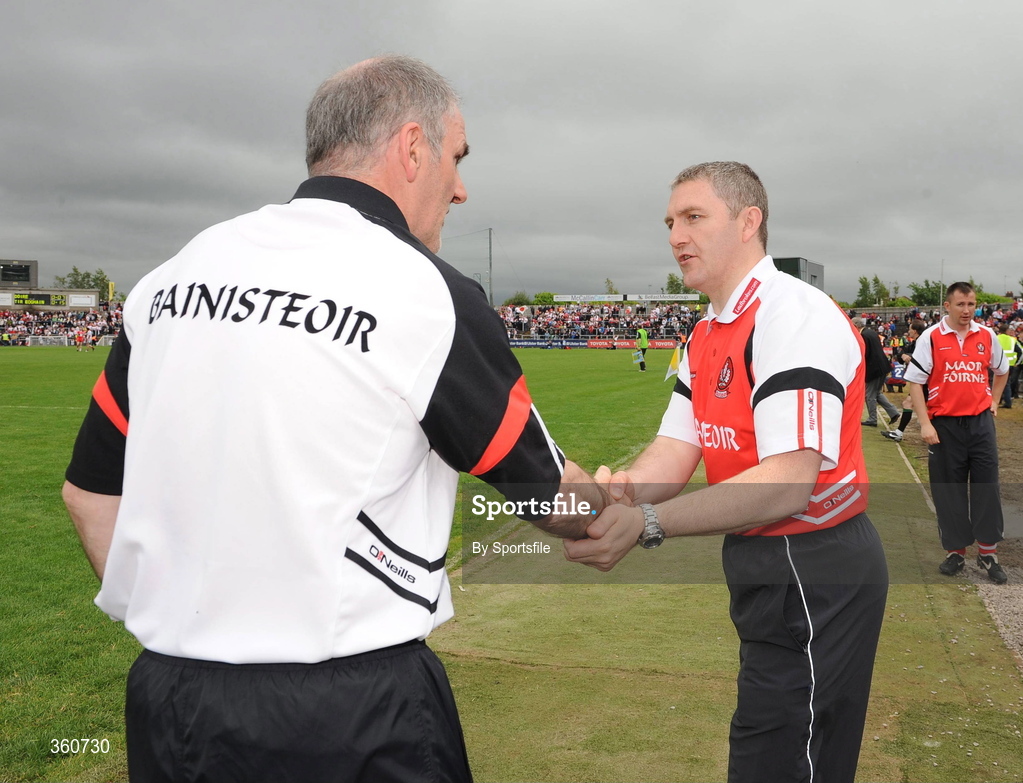 21 June 2009; Tyrone manager Mickey Harte shakes hands with Derry manager Damien Cassidy at the end of the game. GAA Football Ulster Senior Championship Semi-Final, Tyrone v Derry, Casement Park, Belfast, Co. Antrim. Photo by Sportsfile