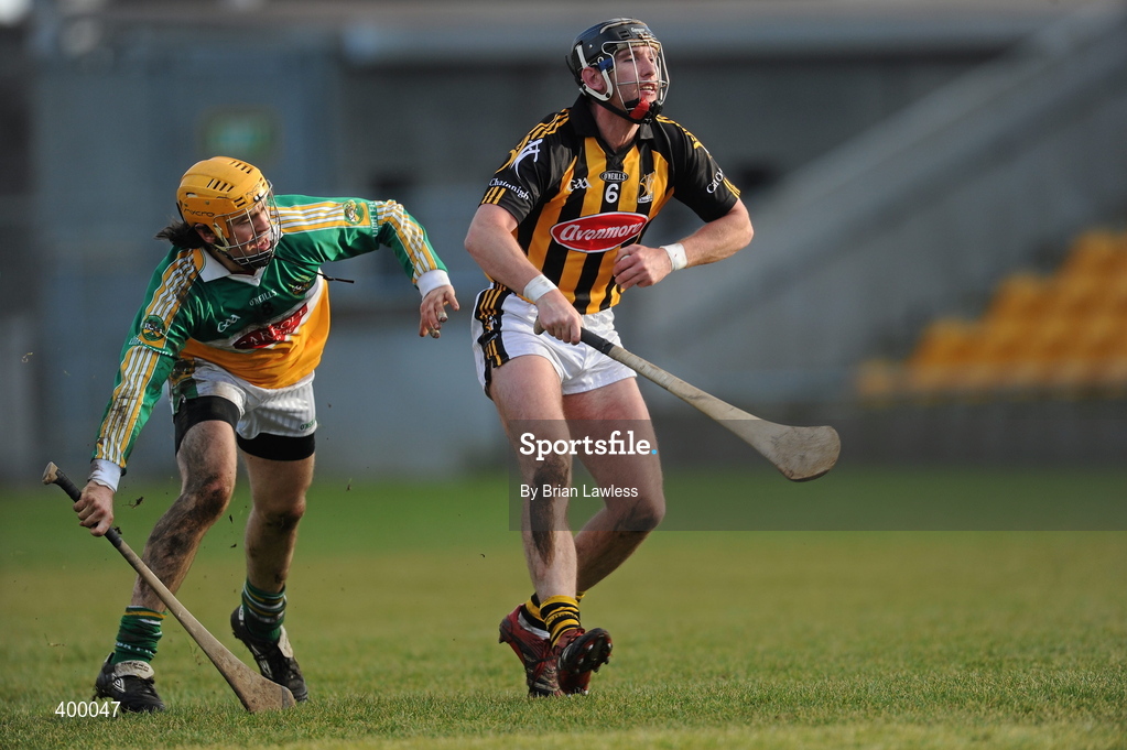 31 January 2010; P.J. Delaney, Kilkenny, in action against Ger Oakley, Offaly. Walsh Cup Quarter-Final, Offaly v Kilkenny, O'Connor Park, Tullamore, Co. Offaly. Picture credit: Brian Lawless / SPORTSFILE *** Local Caption ***