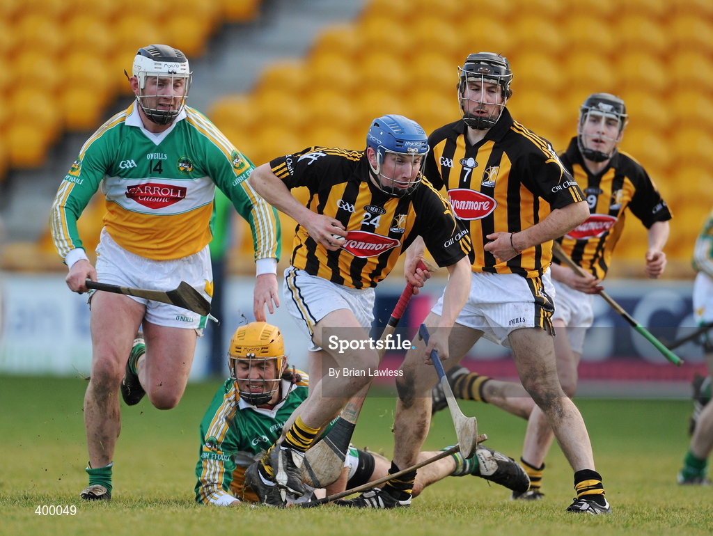31 January 2010; Niall Walsh supported by David Prendergast, Kilkenny, in action against Ger Oakley and Ger Healion, left, Offaly. Walsh Cup Quarter-Final, Offaly v Kilkenny, O'Connor Park, Tullamore, Co. Offaly. Picture credit: Brian Lawless / SPORTSFILE *** Local Caption ***