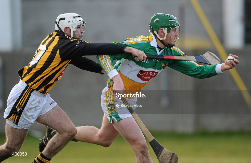 31 January 2010; Eanna Murphy, Offaly, in action against Michael Grace, Kilkenny. Walsh Cup Quarter-Final, Offaly v Kilkenny, O'Connor Park, Tullamore, Co. Offaly. Picture credit: Brian Lawless / SPORTSFILE *** Local Caption ***
