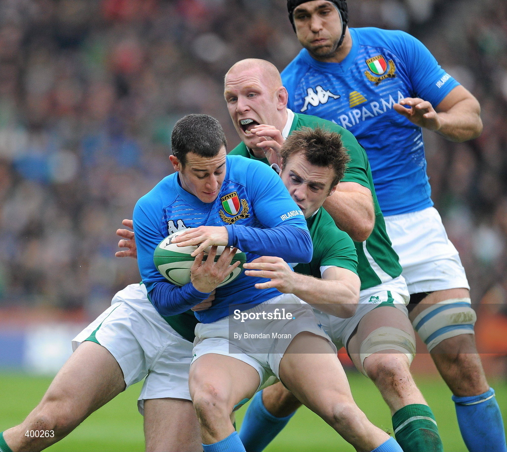 6 February 2010; Kaine Robertson, Italy, is tackled by Tommy Bowe and Paul O’Connell, behind, Ireland. RBS Six Nations Rugby Championship, Ireland v Italy, Croke Park, Dublin. Picture credit: Brendan Moran / SPORTSFILE