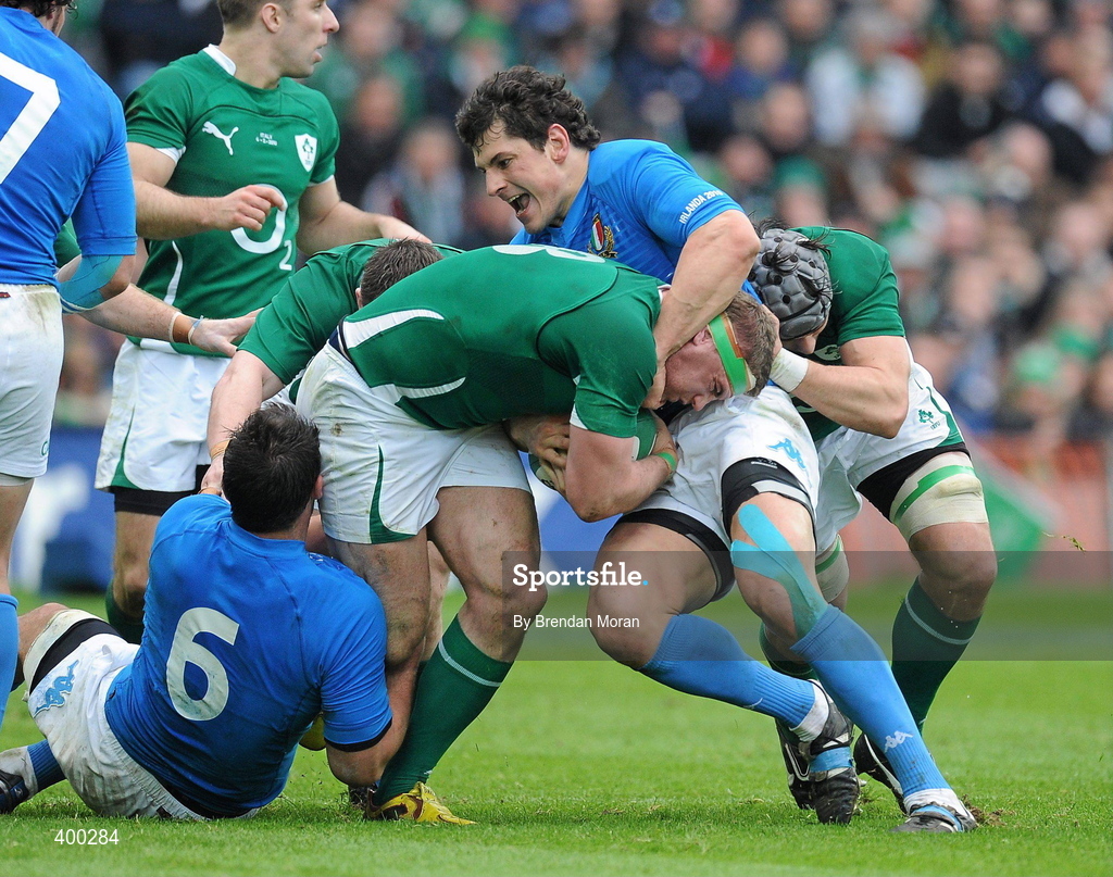 6 February 2010; Jamie Heaslip, Ireland, with support from Kevin McLaughlin, Ireland, is tackled by Josh Sole, 6, and Alessandro Zanni, Italy. RBS Six Nations Rugby Championship, Ireland v Italy, Croke Park, Dublin. Picture credit: Brendan Moran / SPORTSFILE