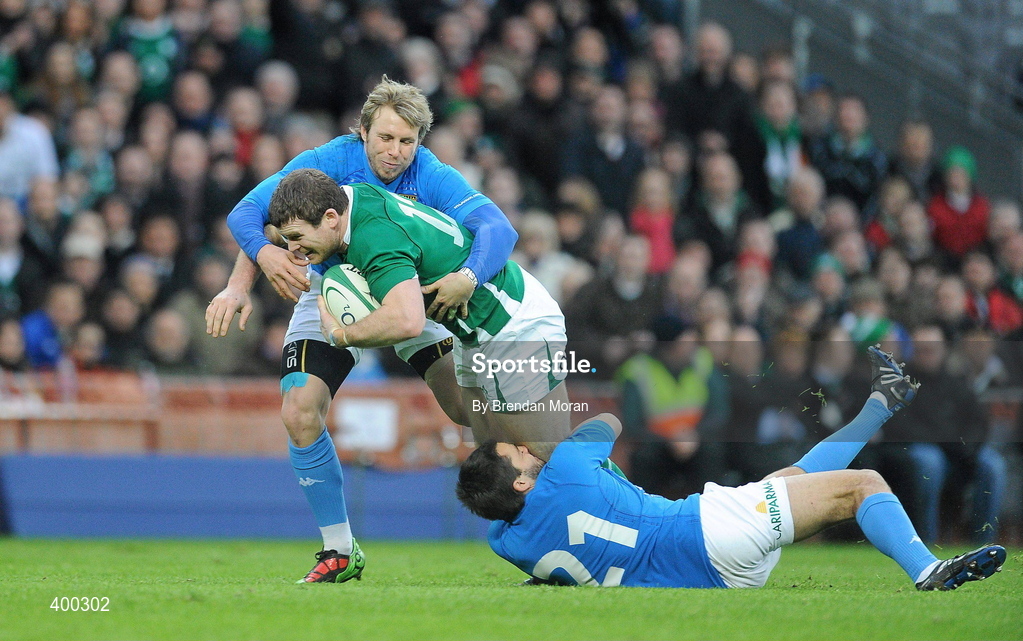 6 February 2010; Gordon D’Arcy, Ireland, is tackled by Simon Picone, left, and Riccardo Bocchino, Italy. RBS Six Nations Rugby Championship, Ireland v Italy, Croke Park, Dublin. Picture credit: Brendan Moran / SPORTSFILE