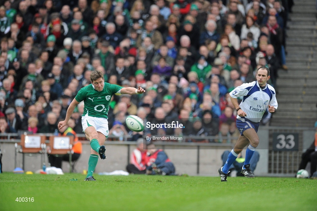 6 February 2010; Ronan O’Gara, Ireland, kicks a penalty watched by referee Romain Poite. RBS Six Nations Rugby Championship, Ireland v Italy, Croke Park, Dublin. Picture credit: Brendan Moran / SPORTSFILE