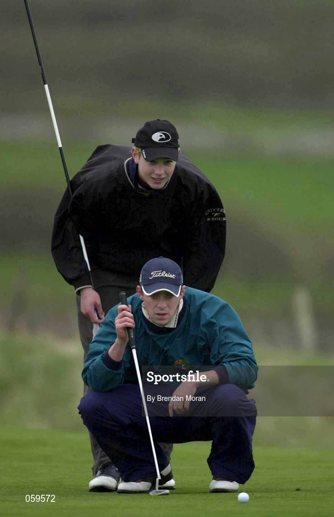 14 April 2001; Mark Murphy of Waterville GC assisted by his caddie Andy Daly, lines up a putt on the 7th green during the West of Ireland Open Golf Championship at Sligo Golf Club in Rosses Point in Sligo. Photo by Brendan Moran/Sportsfile