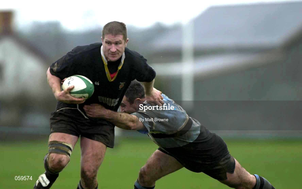14 April 2001; Russell Nelson of Ballymena is tackled by Paul Cleary of Galwegians during the AIB League Division One match between Ballymena and Galwegians at Ballymena Rugby Club in Antrim. Photo by Matt Browne/Sportsfile