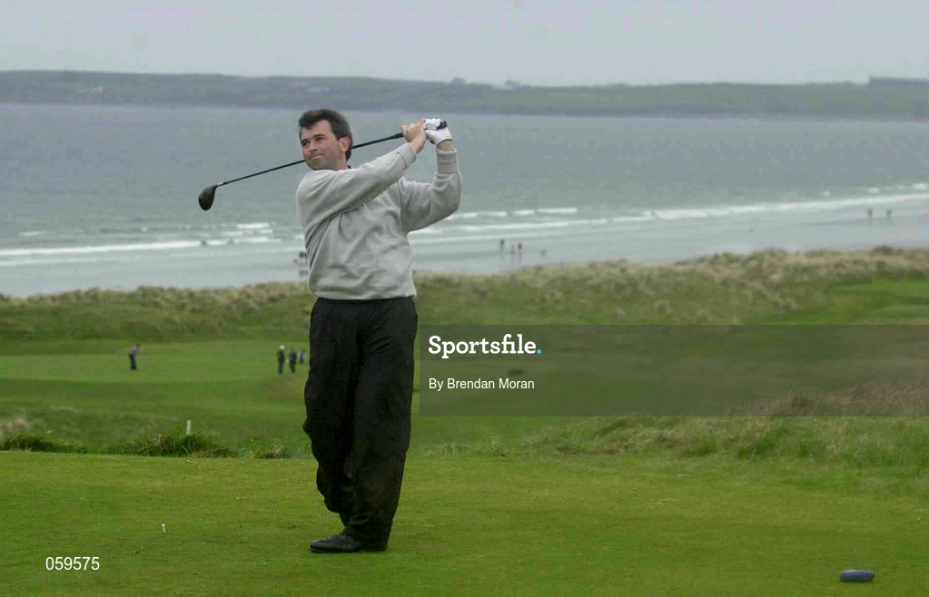 14 April 2001; Stuart Paul of Tandragee GC watches his teeshot from the 18th teebox overlooking Rosses Point during the West of Ireland Open Golf Championship at Sligo Golf Club in Rosses Point in Sligo. Photo by Brendan Moran/Sportsfile