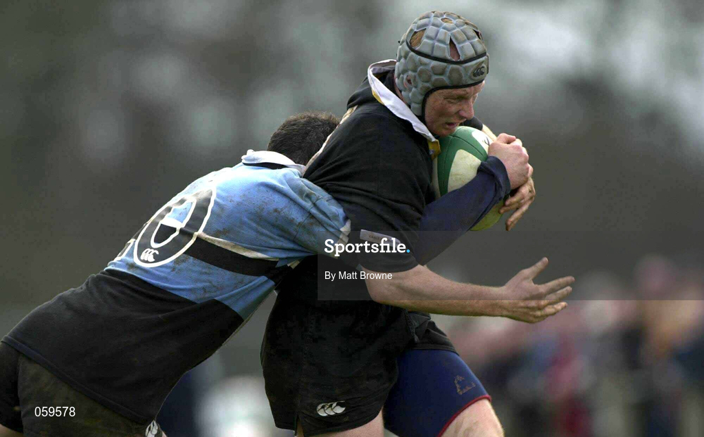 14 April 2001; Neill Doak of Ballymena is tackled by Eric Elwood of Galwegians during the AIB League Division One match between Ballymena and Galwegians at Ballymena Rugby Club in Antrim. Photo by Matt Browne/Sportsfile