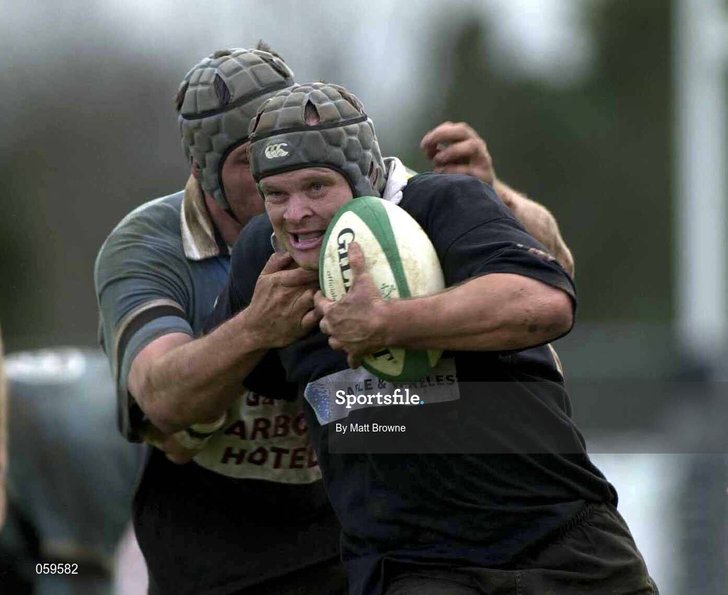 14 April 2001; Rhys Botha of Ballymena is tackled by Mark McConnell of Galwegians during the AIB League Division One match between Ballymena and Galwegians at Ballymena Rugby Club in Antrim. Photo by Matt Browne/Sportsfile