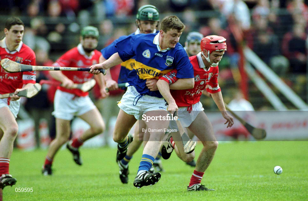 15 April 2001; Noel Morris of Tipperary in action against Seánie McGrath of Cork during the Allianz GAA National Hurling League Division 1B Round 5 match between Tipperary and Cork at Semple Stadium in Thurles, Tipperary. Photo by Damien Eagers/Sportsfile