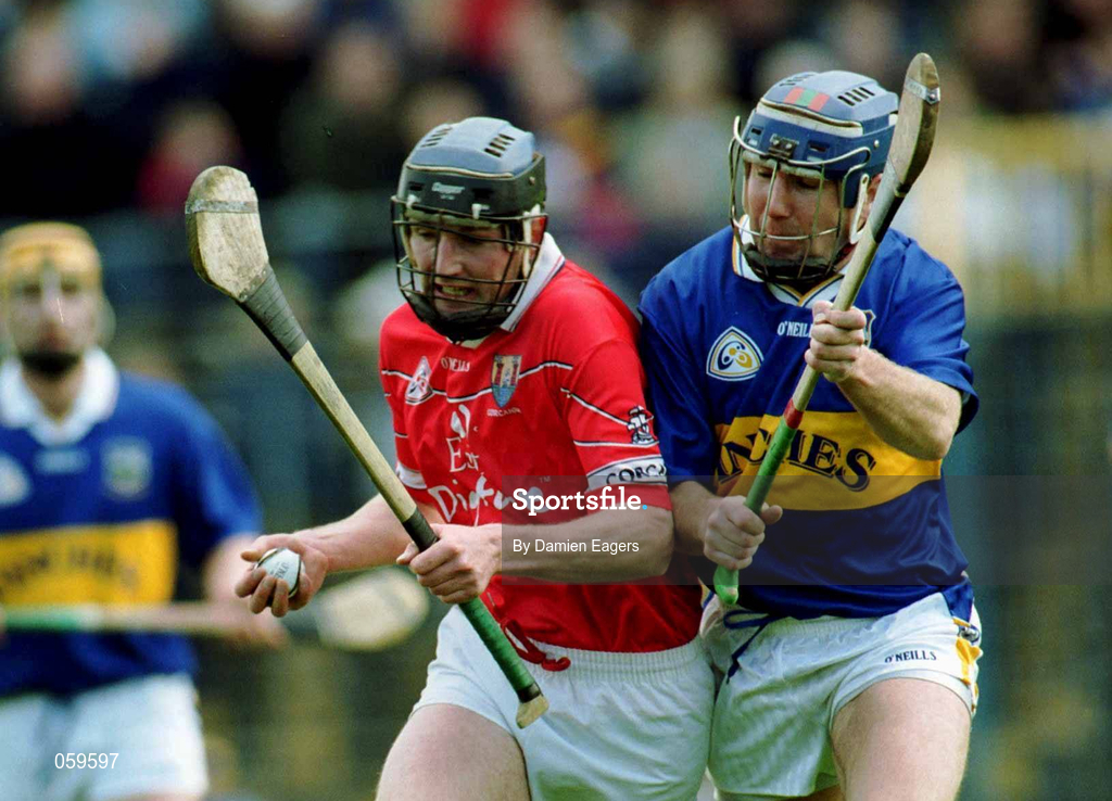 15 April 2001; Pat Mulcahy of Cork in action against John Leahy of Tipperary during the Allianz GAA National Hurling League Division 1B Round 5 match between Tipperary and Cork at Semple Stadium in Thurles, Tipperary. Photo by Damien Eagers/Sportsfile