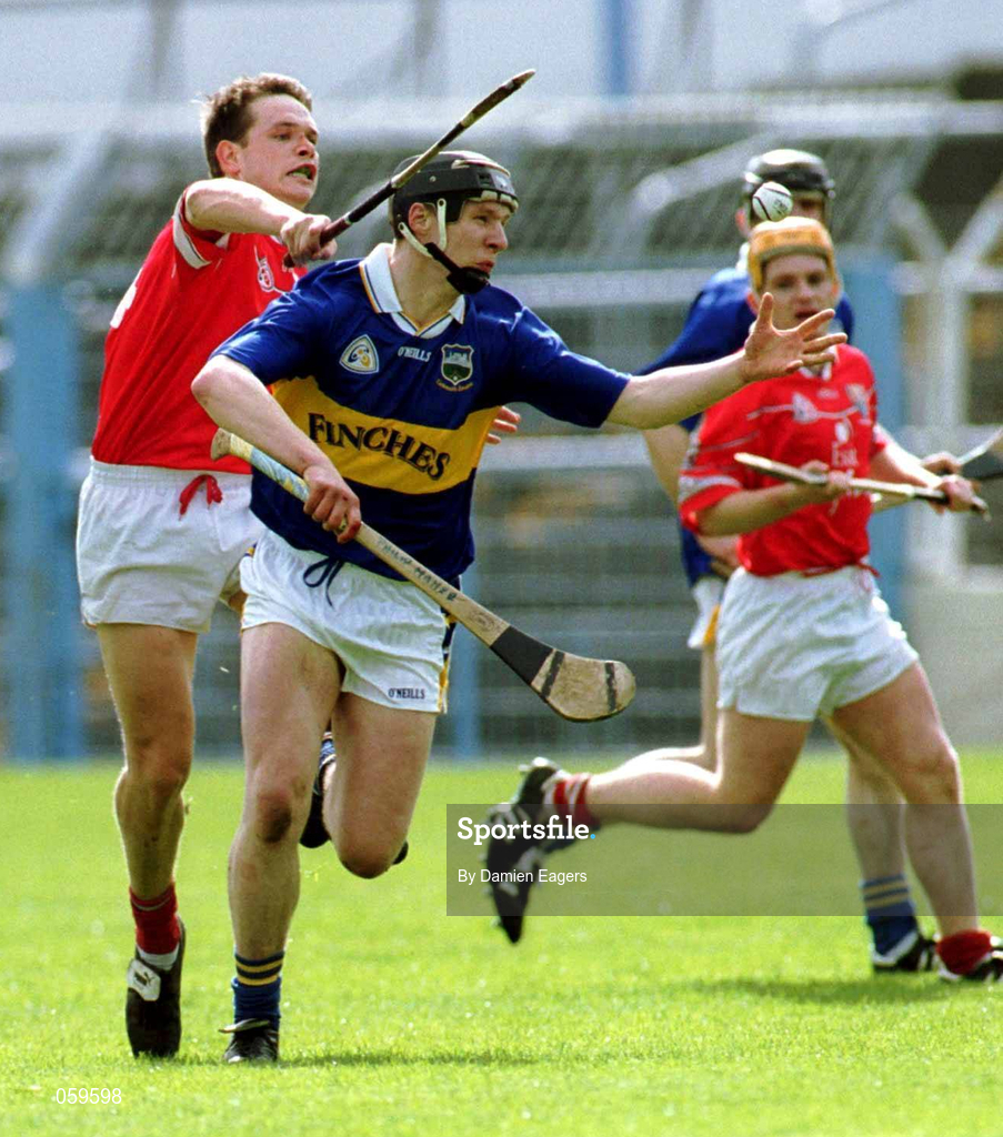 15 April 2001; Philip Maher of Tipperary is tackled by Alan Browne of Cork during the Allianz GAA National Hurling League Division 1B Round 5 match between Tipperary and Cork at Semple Stadium in Thurles, Tipperary. Photo by Damien Eagers/Sportsfile