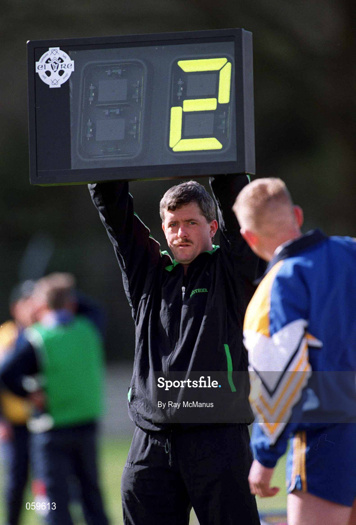 15 April 2001; A Wicklow substitute checks the amount of added time displayed on the board by the fourth official Joe Kelly during the Leinster Senior Hurling Championship First Preliminary Round match between Wicklow and Kildare at Pearse Park in Arklow, Wicklow. Photo by Ray McManus/Sportsfile