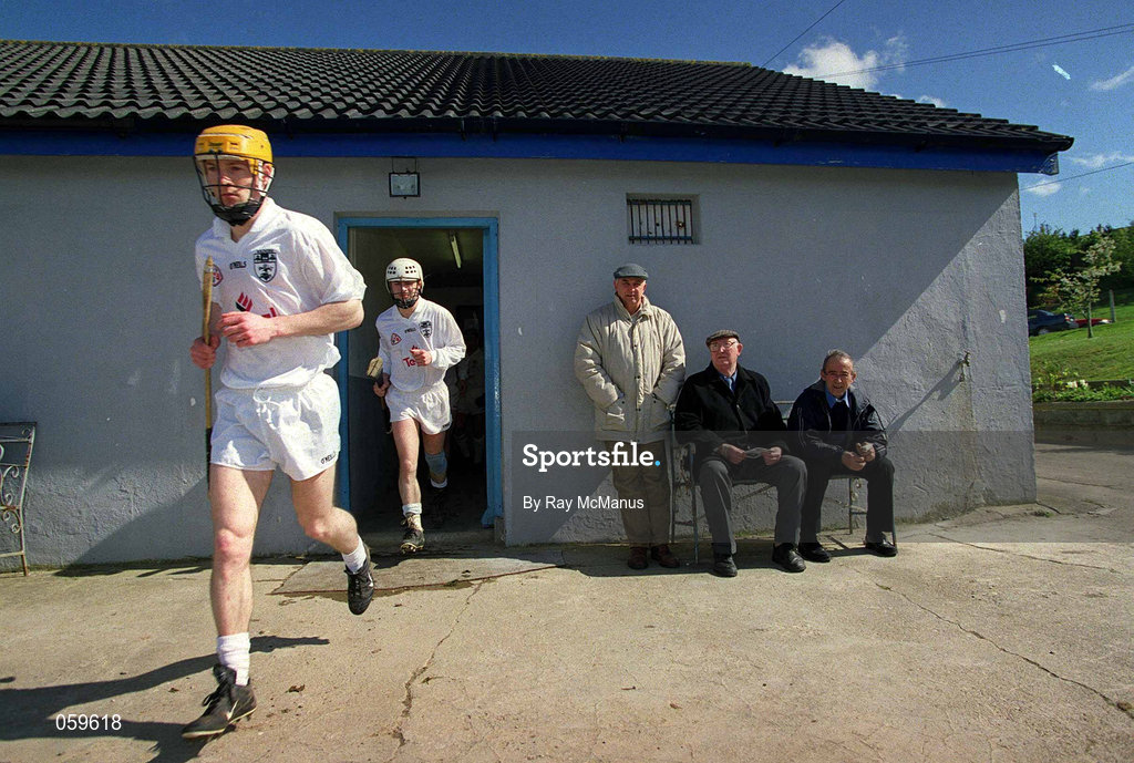 15 April 2001; Kildare players make their way to the field under the watchful eyes of a few Wicklow supporters before the Leinster Senior Hurling Championship First Preliminary Round match between Wicklow and Kildare at Pearse Park in Arklow, Wicklow. Photo by Ray McManus/Sportsfile