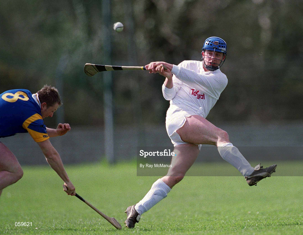 15 April 2001; Noel Casey of Kildare gets his shot away despite the efforts of Joe Murphy of Wicklow during the Leinster Senior Hurling Championship First Preliminary Round match between Wicklow and Kildare at Pearse Park in Arklow, Wicklow. Photo by Ray McManus/Sportsfile