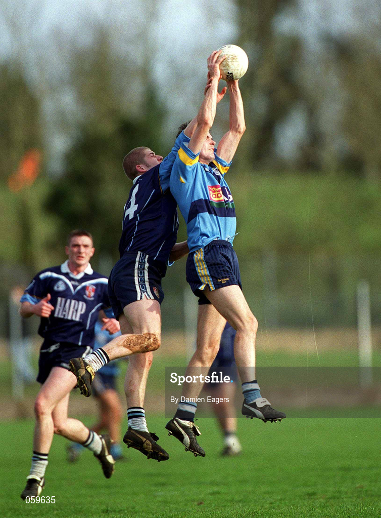 11 April 2001; David Hannify of UCD in action against Kevin Hughes of UUJ during the Sigerson Cup Final match between UCD and UUJ at Scotstown GAA in Monaghan. Photo by Damien Eagers/Sportsfile
