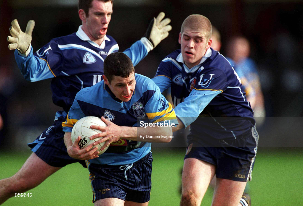 11 April 2001; Joe Fallon of UCD in action against Kevin Hughes of UUJ, right, during the Sigerson Cup Final match between UCD and UUJ at Scotstown GAA in Monaghan. Photo by Damien Eagers/Sportsfile
