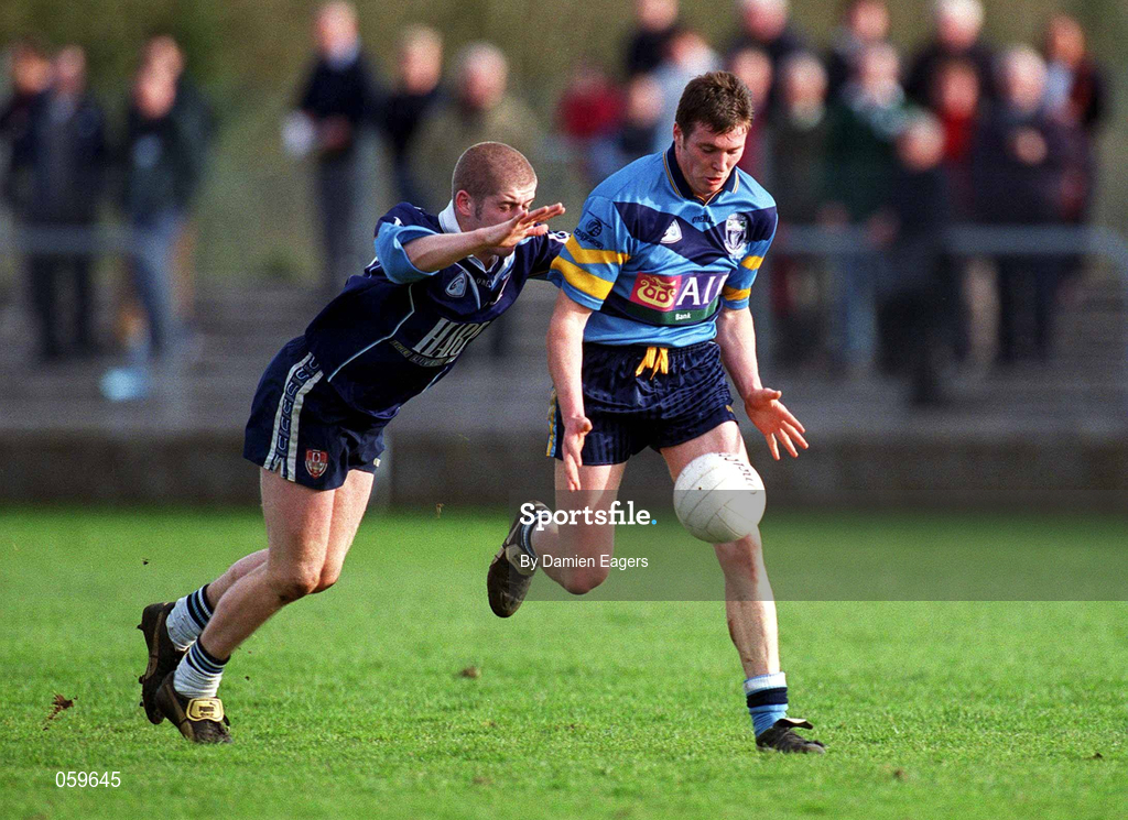 11 April 2001; Ciarán McManus of UCD in action against Kevin Hughes of UUJ during the Sigerson Cup Final match between UCD and UUJ at Scotstown GAA in Monaghan. Photo by Damien Eagers/Sportsfile