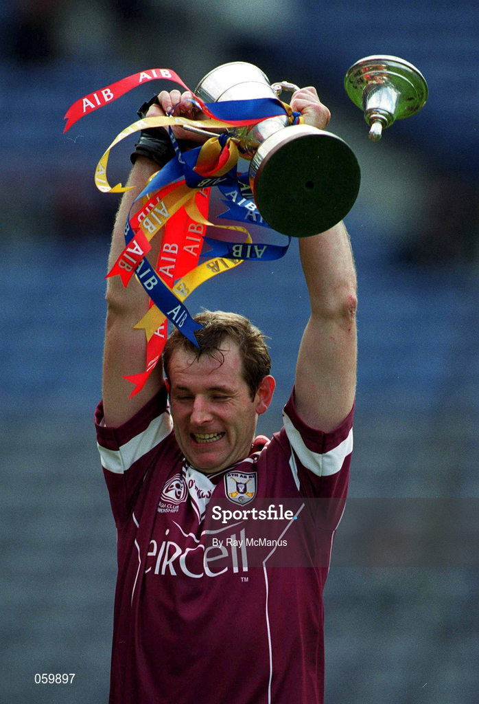 16 April 2001; Athenry captain Joe Rabbitte lifts the Tommy Moore Cup, as the top flies off, after the AIB All-Ireland Senior Club Hurling Championship Final match between Athenry and Graigue Ballycallan at Croke Park in Dublin. Photo by Ray McManus/Sportsfile