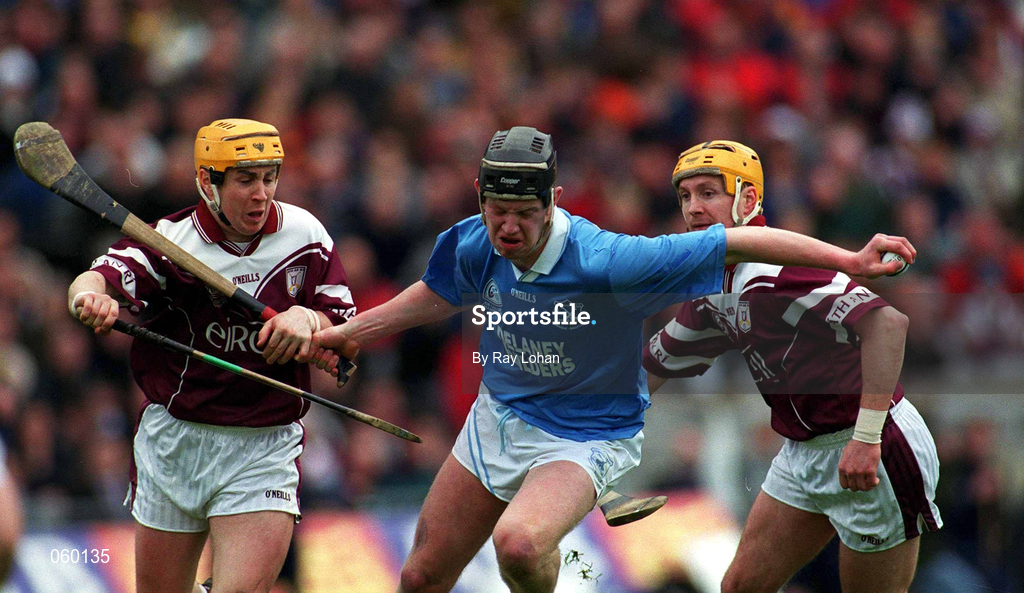 16 April 2001; Michael Hoyne of Graigue Ballycallan in action against Brian Higgins, left, and Eamonn Keogh of Athenry during the AIB All-Ireland Senior Club Hurling Championship Final match between Athenry and Graigue Ballycallan at Croke Park in Dublin. Photo by Ray Lohan/Sportsfile