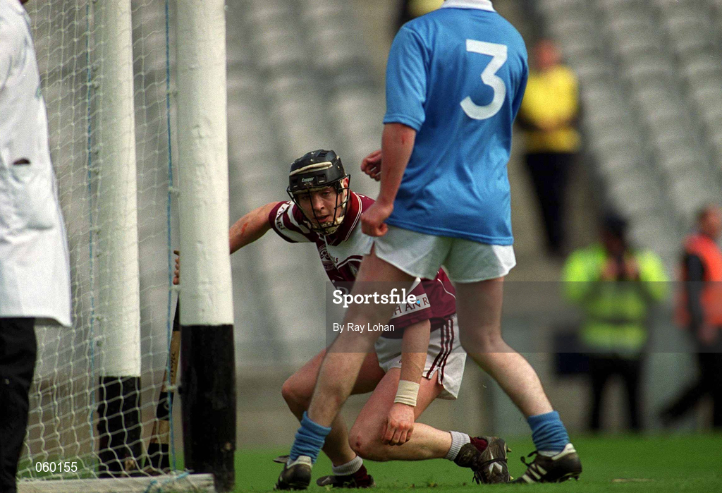 16 April 2001; Eugene Cloonan of Athenry after scoring a last minute goal, with the hurl of his marker Paddy O'Dwyer, to ensure extra-time in the AIB All-Ireland Senior Club Hurling Championship Final match between Athenry and Graigue Ballycallan at Croke Park in Dublin. Photo by Ray Lohan/Sportsfile