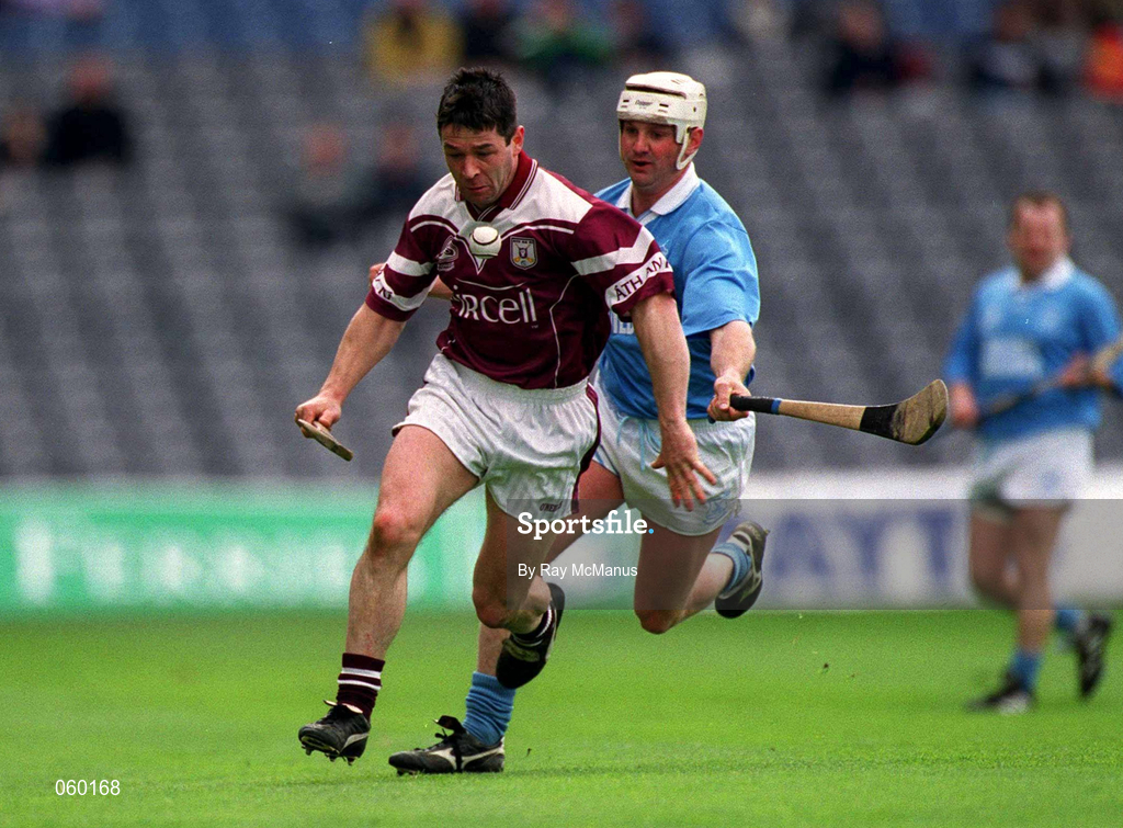 16 April 2001; Pat Higgins of Athenry in action against Alan Hoyne of Graigue Ballycallan during the AIB All-Ireland Senior Club Hurling Championship Final match between Athenry and Graigue Ballycallan at Croke Park in Dublin. Photo by Ray McManus/Sportsfile