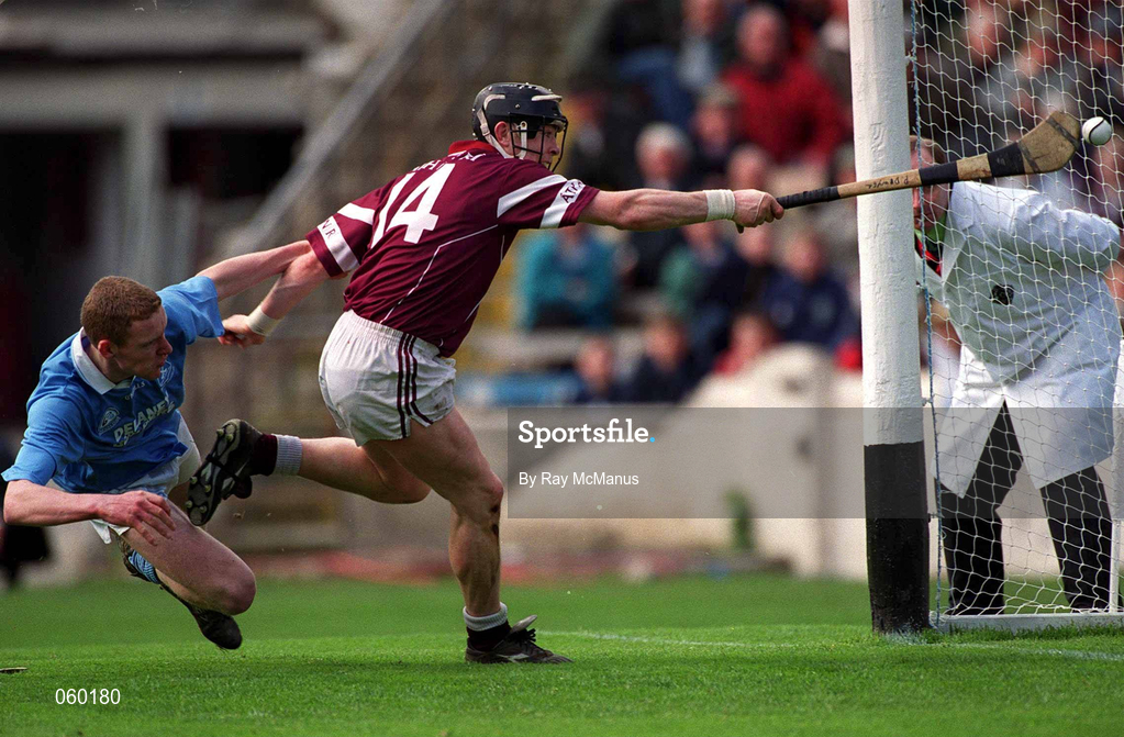 16 April 2001; Eugene Cloonan of Athenry scores a last minute goal, with the hurl of his marker Paddy O'Dwyer, despite the challenge from James Ryall of Graigue Ballycallan, to ensure extra-time in the AIB All-Ireland Senior Club Hurling Championship Final match between Athenry and Graigue Ballycallan at Croke Park in Dublin. Photo by Ray McManus/Sportsfile