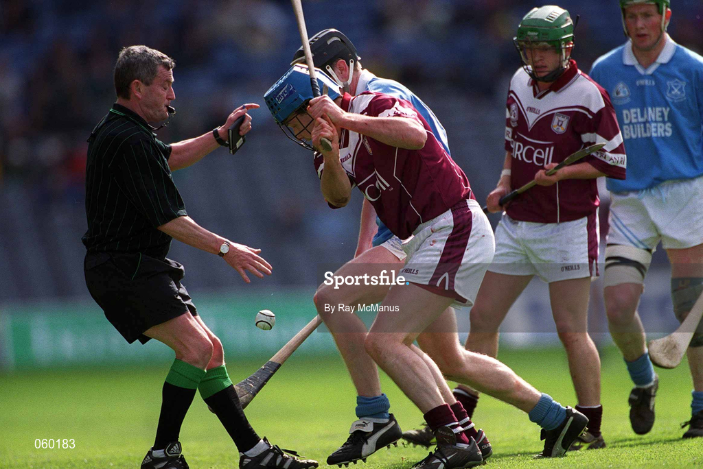 16 April 2001; Referee John McDonnell throws the ball in between Paul Hardiman of Athenry and Michael Hoyne of Graigue Ballycallan during the AIB All-Ireland Senior Club Hurling Championship Final match between Athenry and Graigue Ballycallan at Croke Park in Dublin. Photo by Ray McManus/Sportsfile