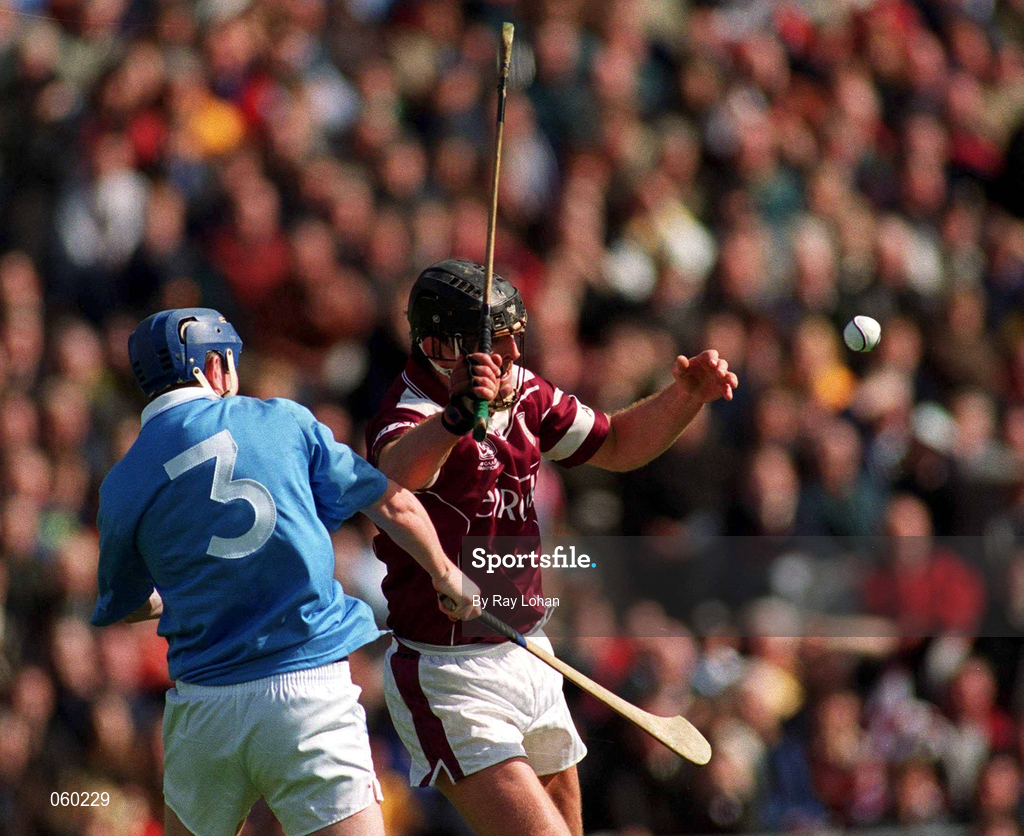 16 April 2001; Joe Rabbitte of Athenry in action against Paddy O'Dwyer of Graigue Ballycallan during the AIB All-Ireland Senior Club Hurling Championship Final match between Athenry and Graigue Ballycallan at Croke Park in Dublin. Photo by Ray Lohan/Sportsfile