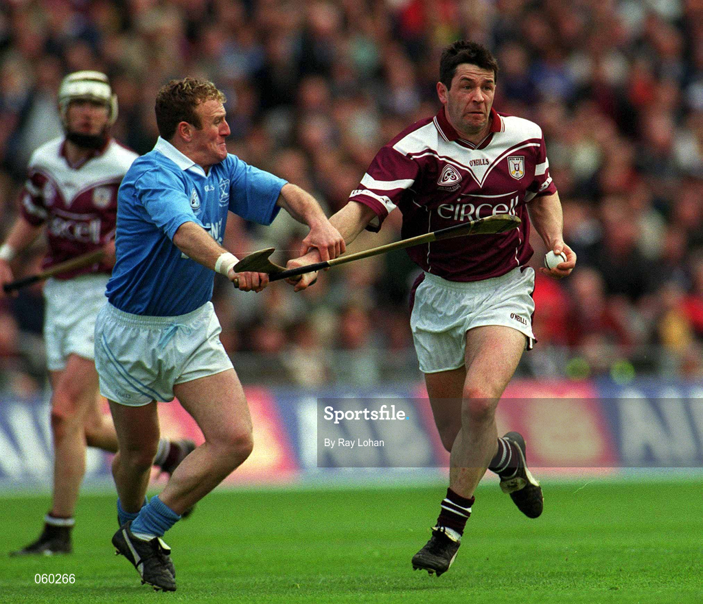 16 April 2001; Pat Higgins of Athenry in action against Johnny Butler of Graigue Ballycallan during the AIB All-Ireland Senior Club Hurling Championship Final match between Athenry and Graigue Ballycallan at Croke Park in Dublin. Photo by Ray Lohan/Sportsfile