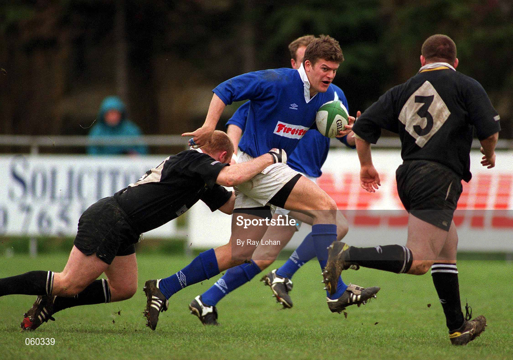 21 April 2001; John McWeeney of St Mary's College is tackled by Shane Stewart of Ballymena during the AIB All-Ireland League Division 1 match between St Mary's College and Ballymena at Templeville Road in Dublin. Photo by Ray Lohan/Sportsfile