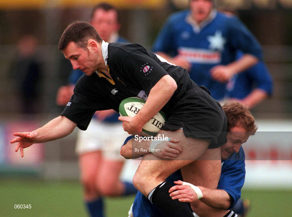 21 April 2001; William McAllister of Ballymena is tackled by Denis Hickie of St Mary's College during the AIB All-Ireland League Division 1 match between St Mary's College and Ballymena at Templeville Road in Dublin. Photo by Ray Lohan/Sportsfile