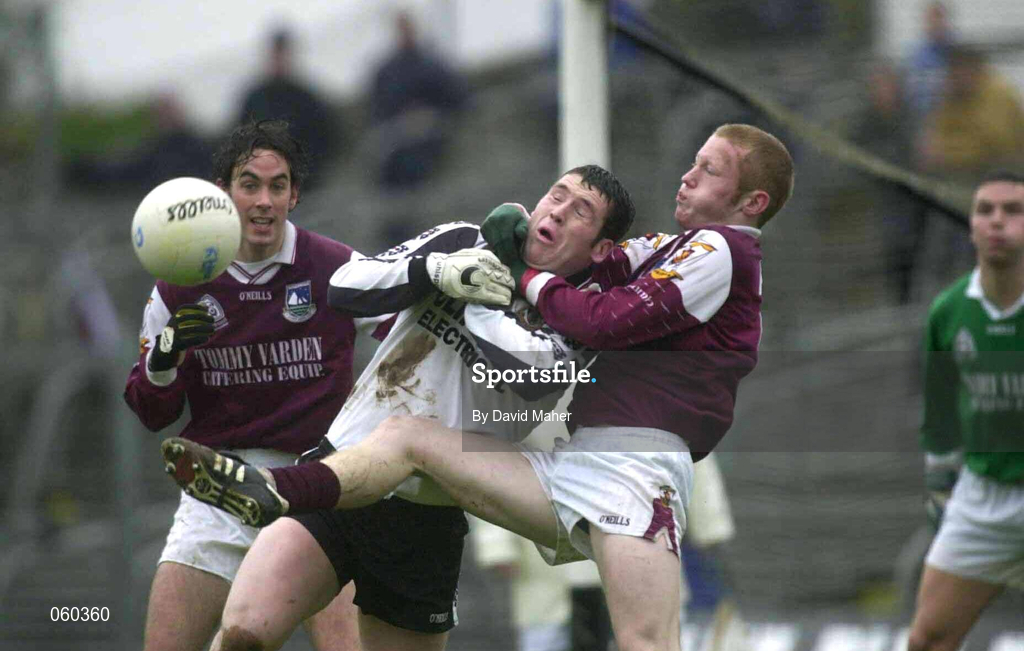 21 April 2001; John McPartland of Sligo is tackled by Michael Comer of Galway during the Allianz GAA National Football League Division 1 Semi-Final match between Galway and Sligo in Dr Hyde Park in Roscommon. Photo by David Maher/Sportsfile